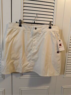 Champion women’s Cream skirt with Side Logo